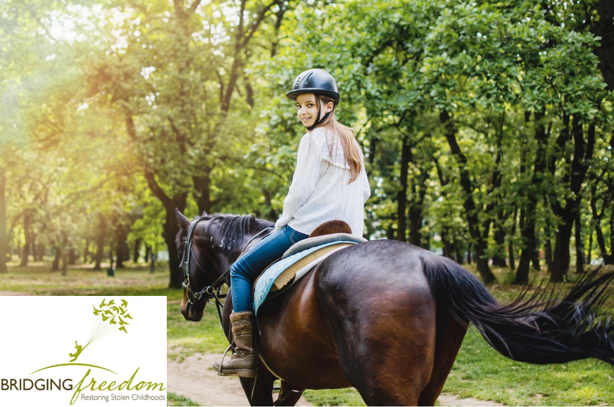 young girl horseback riding for holistic healing